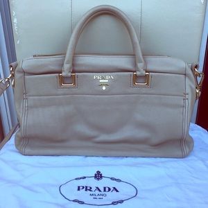 Beige leather satchel with drop handle strap